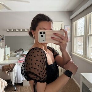 Elegant Black Sheer Sleeve Top with heart detailing